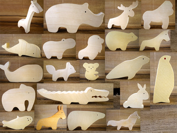 Choix de 4 figurines en bois ( animaux )